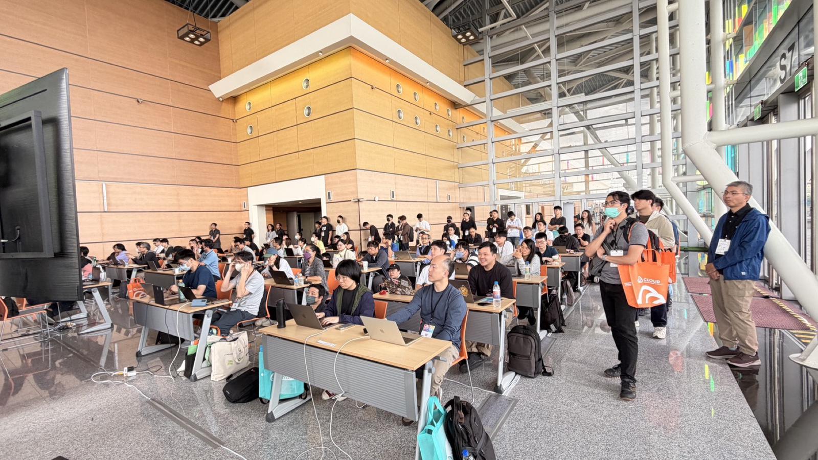 The LAB workshop room — every seat taken, people standing in the back